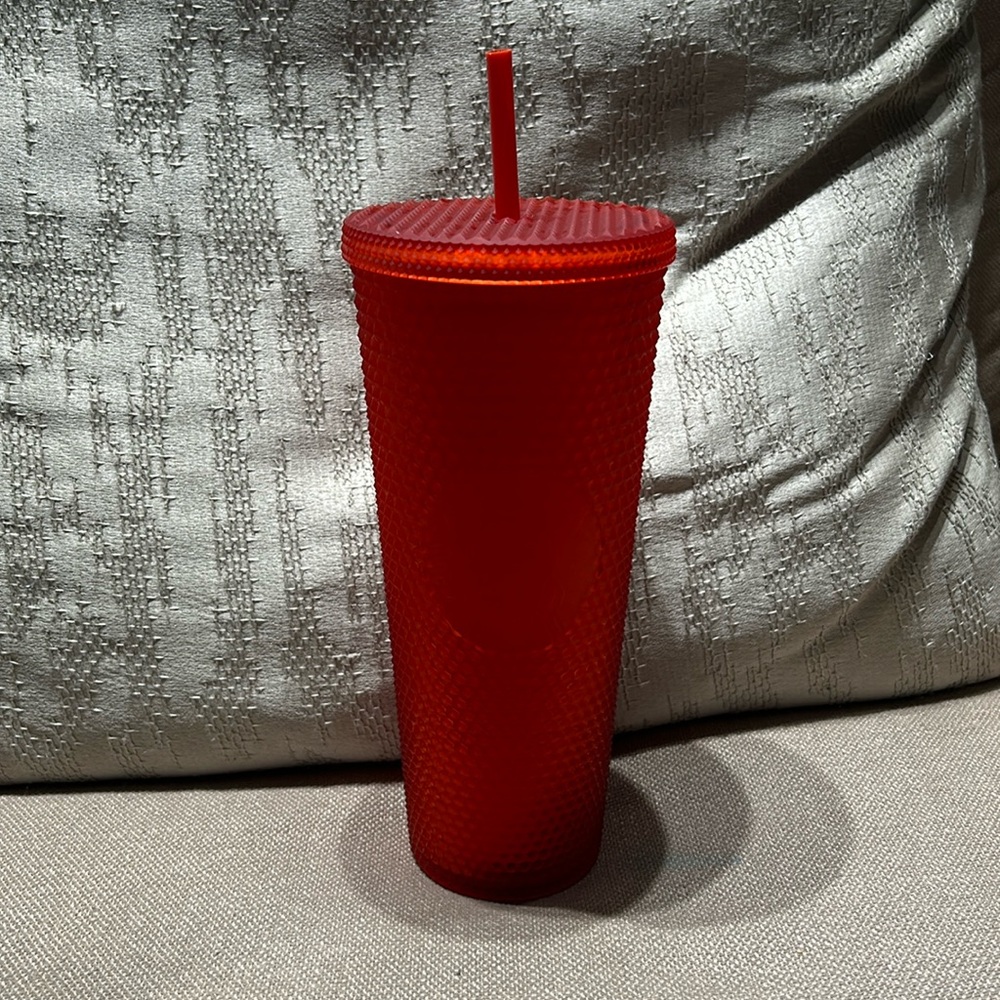 Starbucks red cup with straw